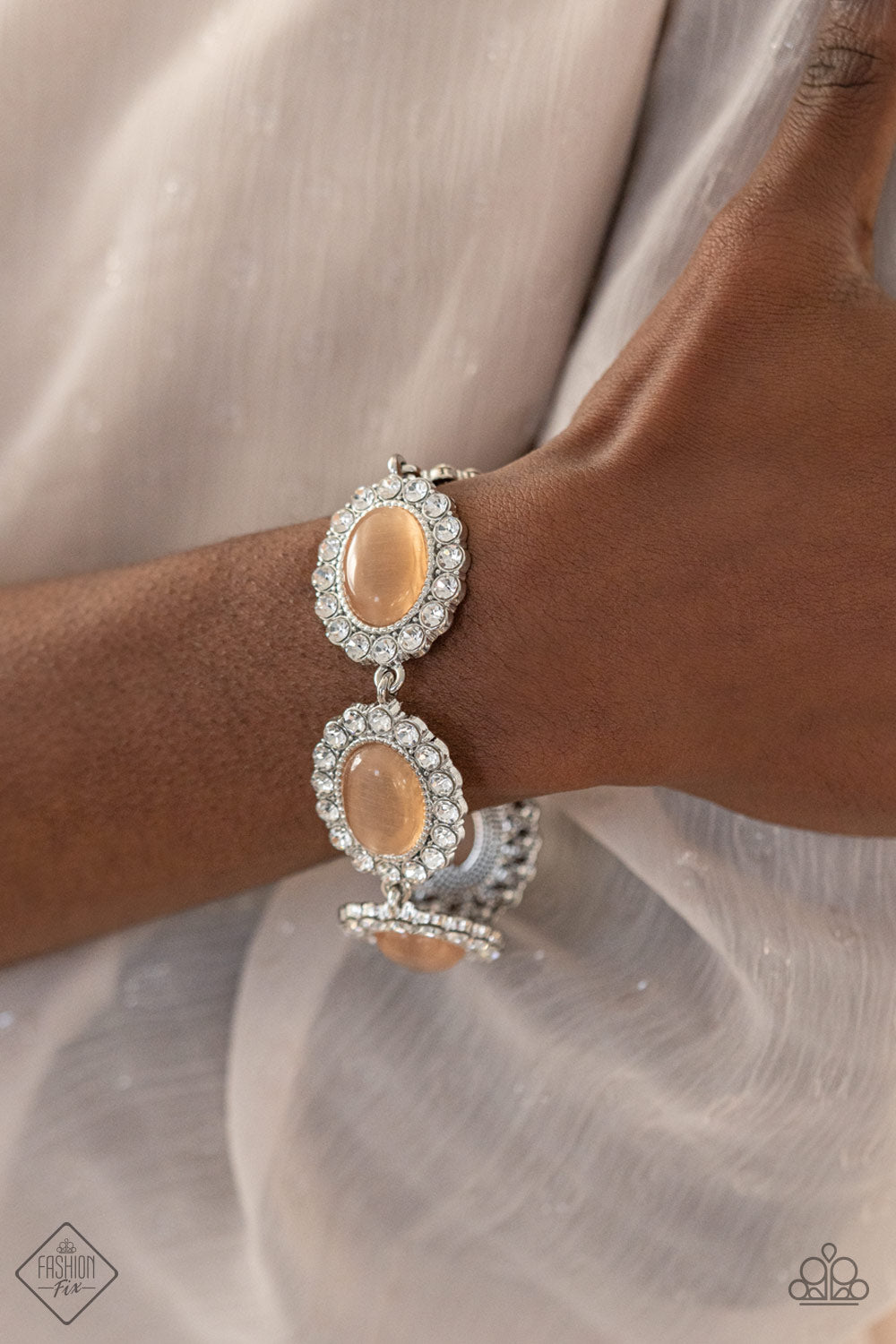 Paparazzi Accessories-Demurely Diva Orange Eye Cats Bracelet