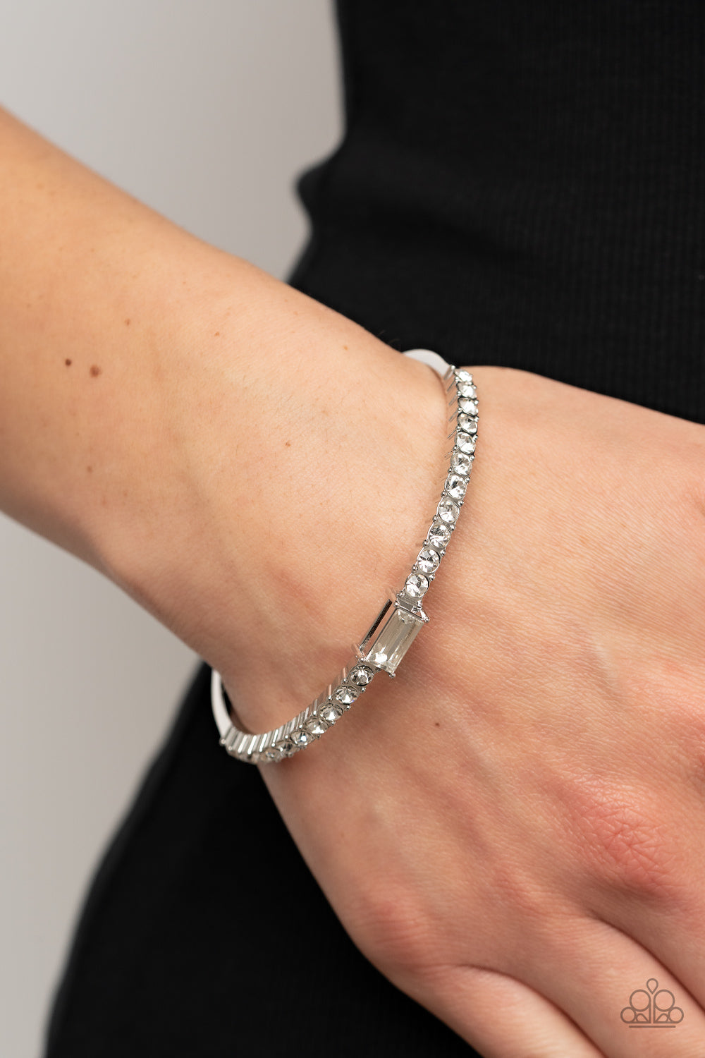 Paparazzi Accessories-Party Crashing Couture White Rhinestone Bangle Bracelet