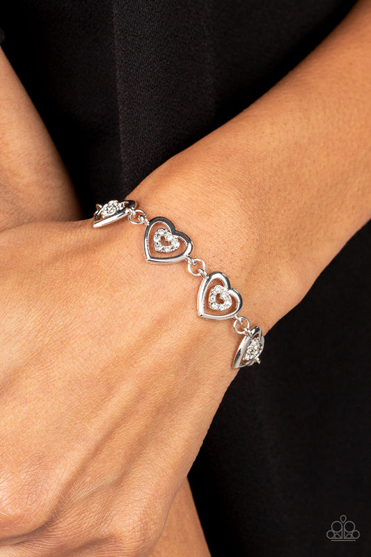 Paparazzi Accessories-Catching Feelings White Rhinestone Heart Bracelet