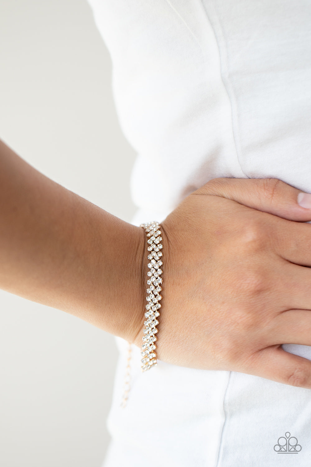 Paparazzi Accessories-Chicly Candescent Gold Sleek White Rhinestone Bracelet