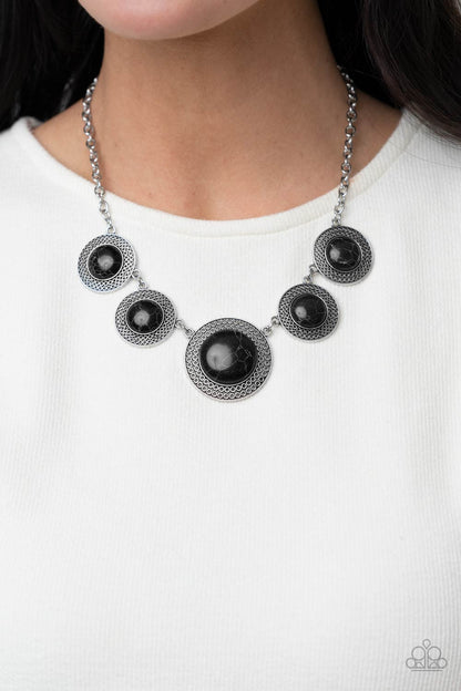 Paparazzi Accessories-Circle The Wagons Black Rustic Stone Necklace Set