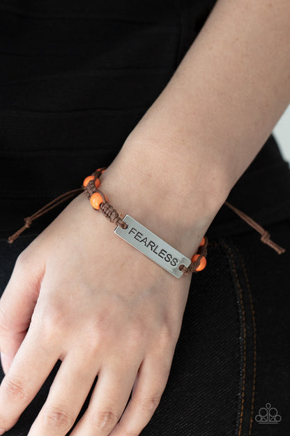 Paparazzi Accessories-Conversation Piece Orange Engraved "Fearless" Bracelet