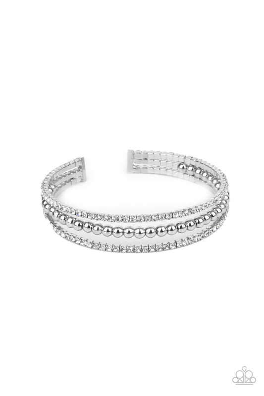 Paparazzi Accessories-High-End Eye Candy White Rhinestone Sparkly Cuff Bracelet