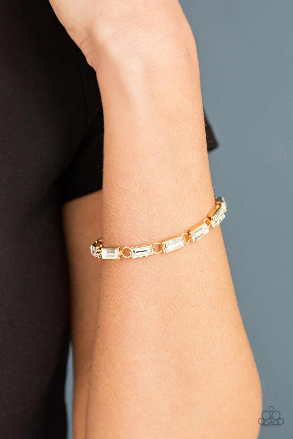 Paparazzi Accessories-Irresistibly Icy Gold Emerald Cut Bracelet