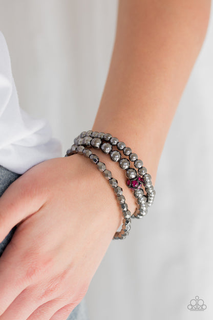 Paparazzi Accessories-Noticeably Noir Pink Bracelet