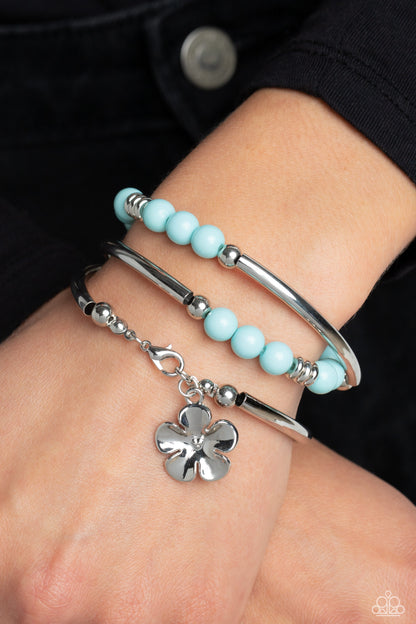 Paparazzi Accessories-Off The WRAP Blue Bead Silver Flower Charm Bracelet