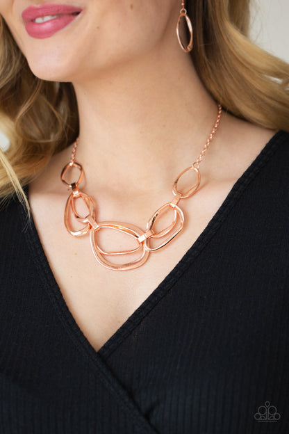 Paparazzi Accessories-Prehistoric Heirloom Copper Asymmetrical Twisted Necklace Set