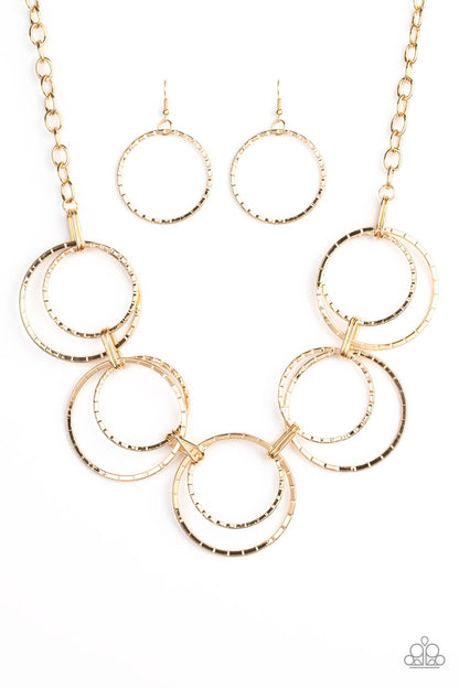 Paparazzi Accessories-Radiant Revolution Gold Linear Necklace Set