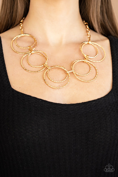Paparazzi Accessories-Radiant Revolution Gold Linear Necklace Set