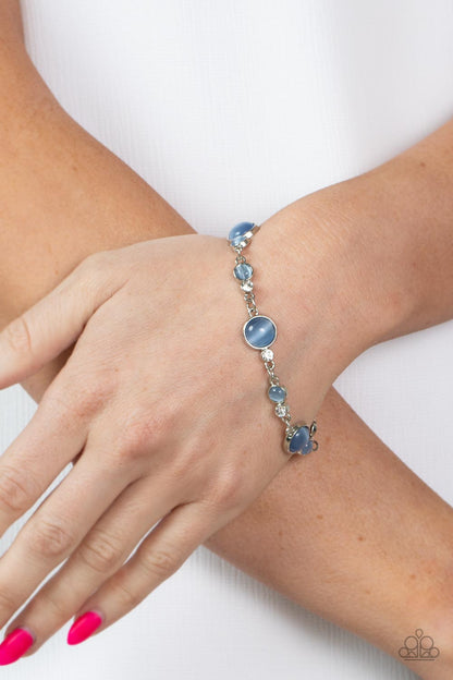 Paparazzi Accessories-Storybook Beam Blue Cat's Eye White Rhinestone Bracelet